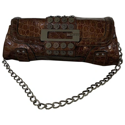 Pre-owned Guess Clutch Bag In Brown