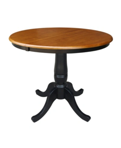 International Concepts 36" Round Top Pedestal Table With 12" Leaf In Rust