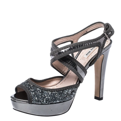 Pre-owned Miu Miu Metallic Grey Glitter And Suede Leather Trim Cross Strap Peep Toe Platform Sandals Size 37.5