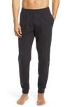 Alo Yoga Co-op Pocket Tapered Joggers In Black