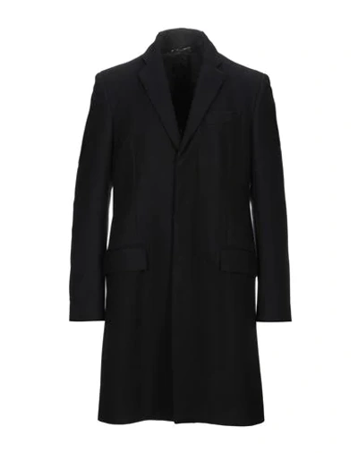 Dolce & Gabbana Coats In Black