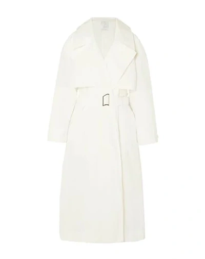 Deveaux Overcoats In White