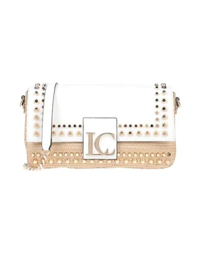 La Carrie Handbags In White