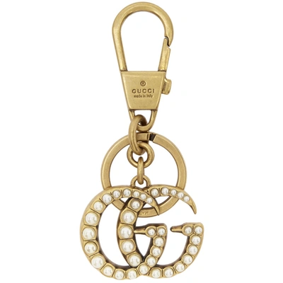 Gucci Pearl-embellished Double G Key Ring In 8817 Ottone