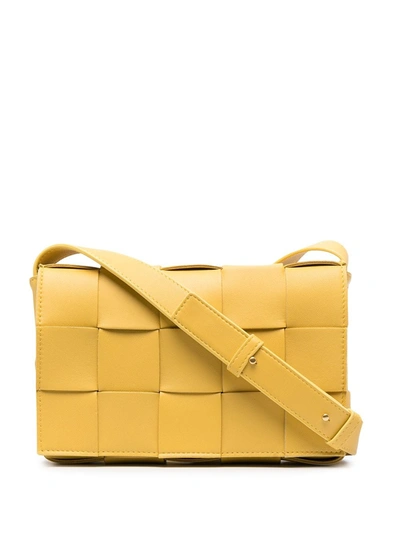 Bottega Veneta The Cassette Leather Crossbody Bag In Yellow