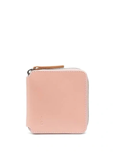 Ally Capellino Logo Embossed Zipped Wallet In Pink