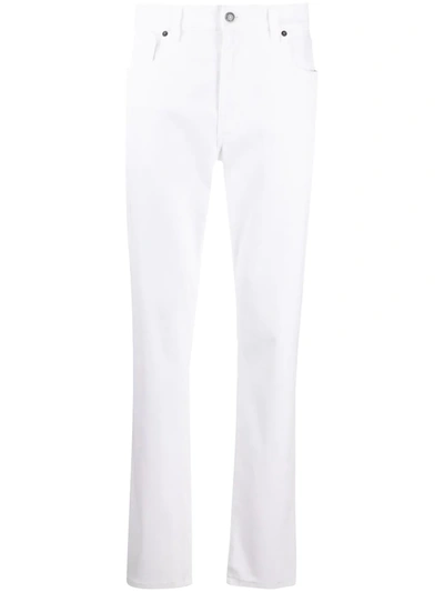 Moschino Logo Plaque Denim Jeans In White