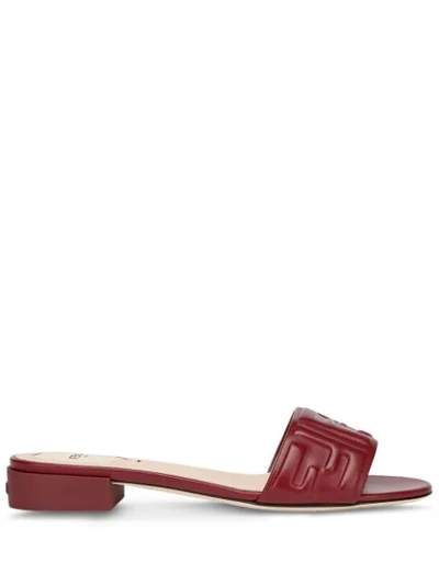 Fendi Embossed Logo Low Heel Slide Sandals In Brown