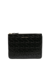 Comme Des Garçons Comme Des Garcons Star Embossed Pouch In Black, Geometric Print.