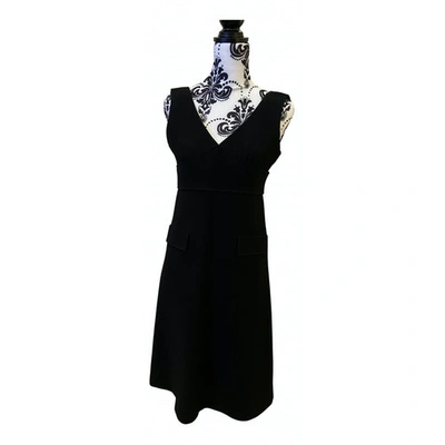 Pre-owned Courrèges Wool Mid-length Dress In Black