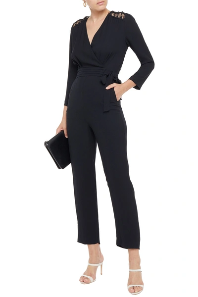 Sandro Noya Wrap-effect Macramé Lace-paneled Crepe Jumpsuit In Black