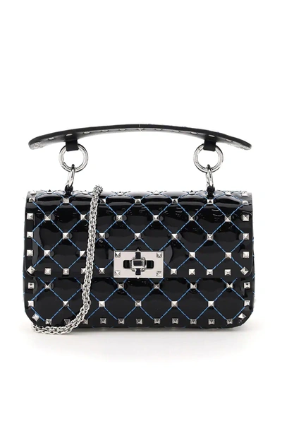 Valentino Garavani Small Rockstud Spike Patent Bag In Black,light Blue