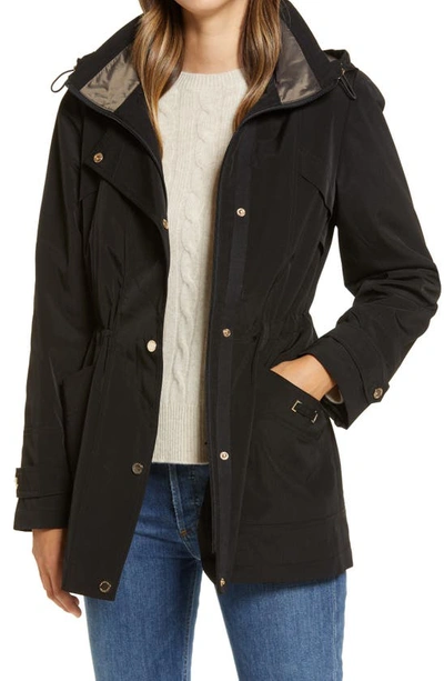 Gallery Cinched Waist Hooded Raincoat In Black