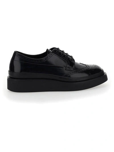 Prada Platform Brogue Shoes In Black