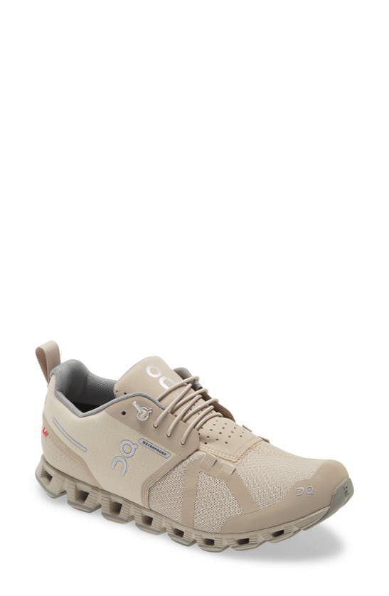 beige running sneakers