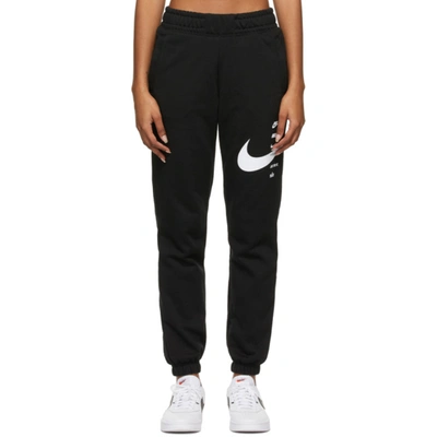 Nike Black Sportswear Swoosh Lounge Pants In 011 Black