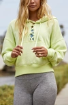 Free People Fp Movement Believe It Lace-up Hoodie In Key Lime