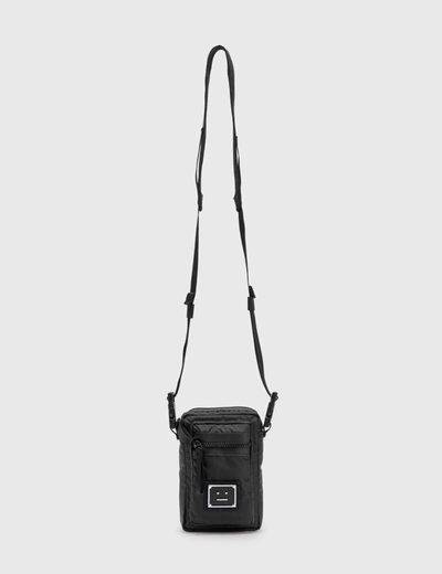 Acne Studios Arvel Plaque Face Crossbody Bags In Black