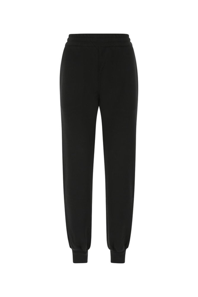 Alexander Mcqueen Embroidered Logo Track Trousers In Black