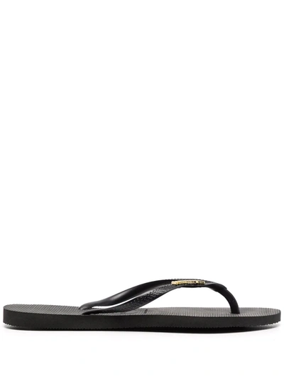 Havaianas Logo-embossed Rubber Flip-flops In Black