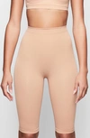 Skims Sculpting Above The Knee Shorts In Ochre