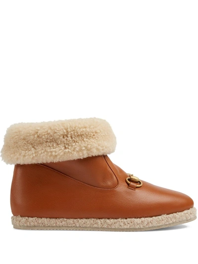 Gucci Faux Shearling Leather Ankle Boots In Brown