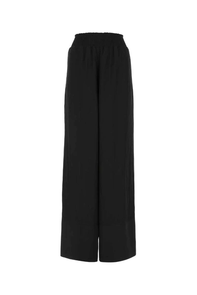 Jw Anderson Elasticated Cuff Tailored Trousers In Black