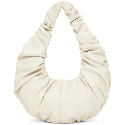 Nanushka Anja Ruched Faux-leather Baguette Bag In Off White