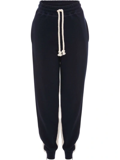 Jw Anderson Paneled Cotton-jersey Track Trousers In Blue