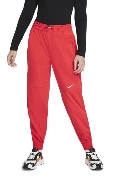 Nike Sportswear Swoosh Women's Woven Trousers In Red/red