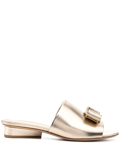 Ferragamo Valery Viva Metallic Vara Bow Slide Sandals In Gold