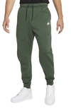 Nike Sportswear Slim Fit Tech Fleece Jogger Pants In Galactic Jade/light Lime