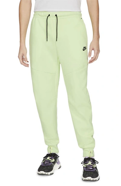 Nike Sportswear Slim Fit Tech Fleece Jogger Pants In Light Liquid Lime/black