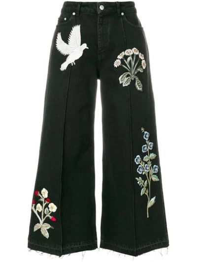 Alexander Mcqueen Swallow Gryphon Floral Appliqué Culotte Jeans In Black