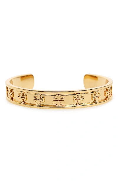 Tory Burch Raised Logo Cuff Bracelet In Silvertone Brass In Tory Gold