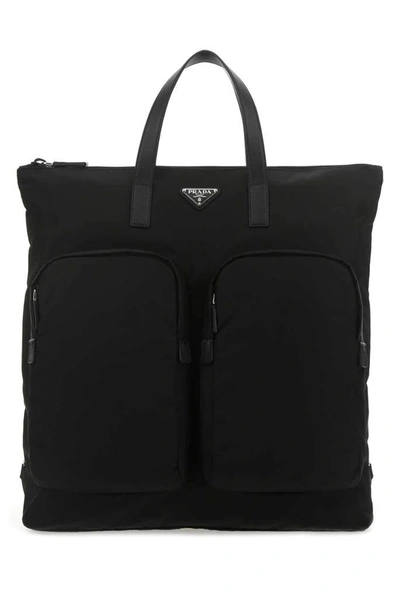 Prada Zipped Pocket Tote Bag In Black