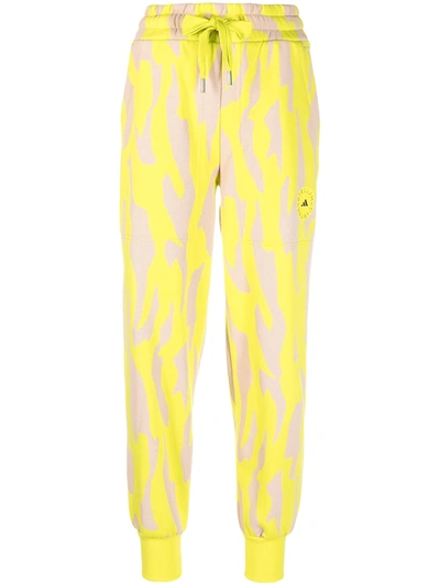 Adidas By Stella Mccartney Tiger Print Tapered Track Trousers In Aciyel/ Pearos