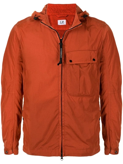 C.p. Company Red Jacket With Goggle Hood Detail In Orange