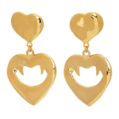 Saint Laurent Gold Vampire Heart Pendant Earrings In 8060 Laiton Gold