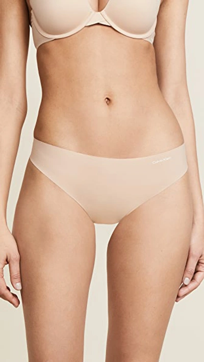 Calvin Klein Underwear Invisibles Thong In Light Caramel