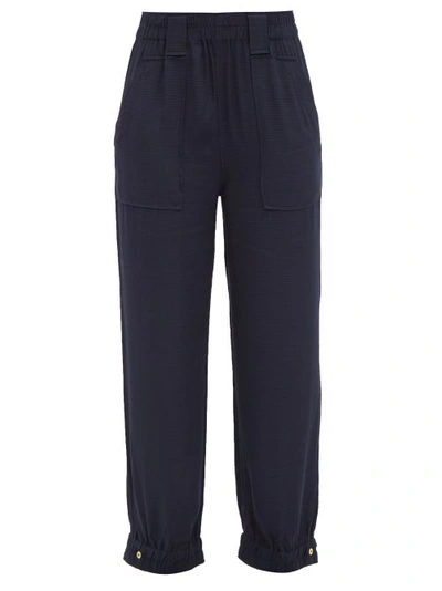 Ganni Embroidered Check-pattern Tapered High-rise Stretch-woven Trousers In Sky Captain
