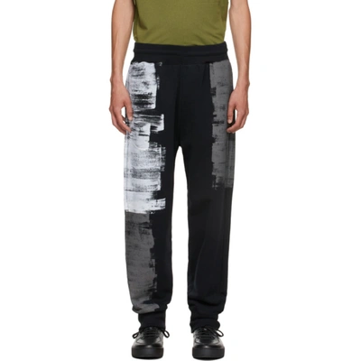 A-cold-wall* Painterly-print Organic-cotton Track Trousers In Black