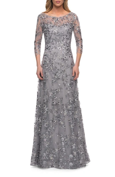 La Femme Lace Gown With Full Skirt And Sheer Lace Sleeves In Grey