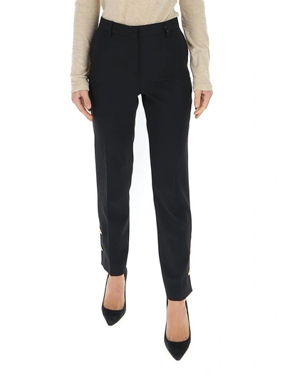 Versace Button Embellished Pants In Black