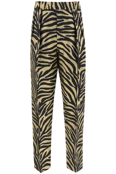 Khaite Magdeline Zebra Print Trousers In Gold Black Zebra (black)