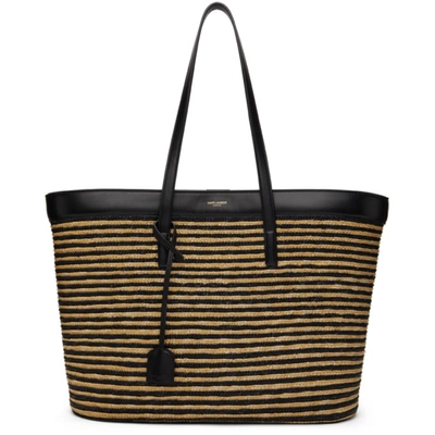 Saint Laurent East-west Striped Straw Shopping Tote Bag In 7088 Paille Or/ne