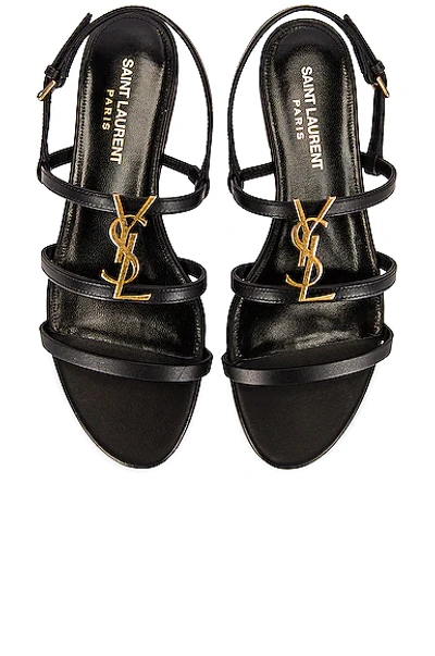 Saint Laurent Cassandra Leather Flat Sandals In Noir