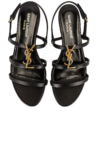 Saint Laurent Cassandra Leather Flat Sandals In Schwarz