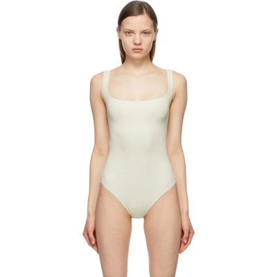 Skims Ribbed Stretch Cotton Bodysuit In Bone