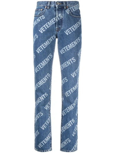Vetements All-over Logo Cotton Denim Jeans In Blue